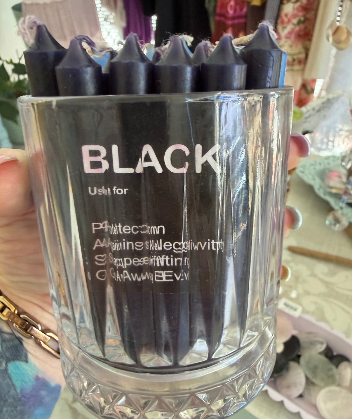 Candles spell wish blue or black